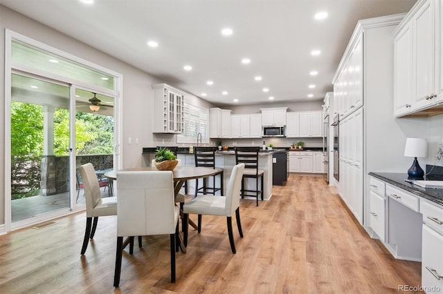 11911 E Lake Cir, Greenwood Village, CO 80111 - dining space with recessed lighting, a ceiling fan, and light wood-type flooring