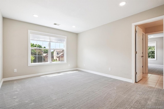 11911 E Lake Cir, Greenwood Village, CO 80111 - carpeted spare room with baseboards and recessed lighting