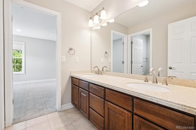 11911 E Lake Cir, Greenwood Village, CO 80111 - bathroom with double vanity and tile patterned flooring
