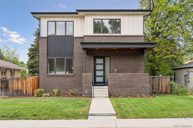 1373 S Garfield St, Denver, CO 80210 - modern home featuring brick siding and board and batten siding