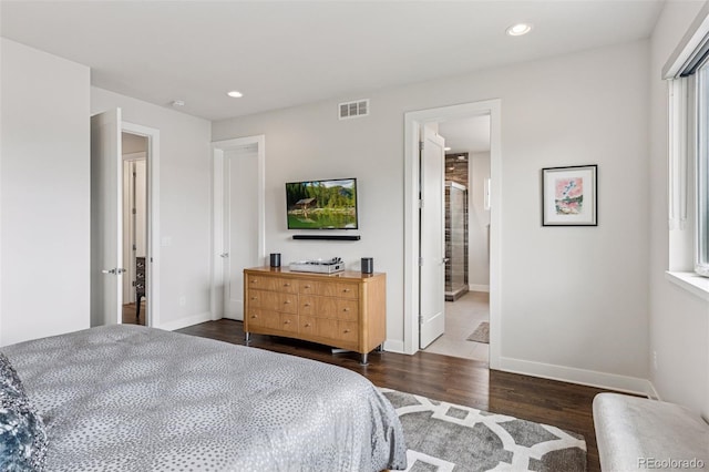 1373 S Garfield St, Denver, CO 80210 - bedroom with dark wood-type flooring, recessed lighting, and baseboards