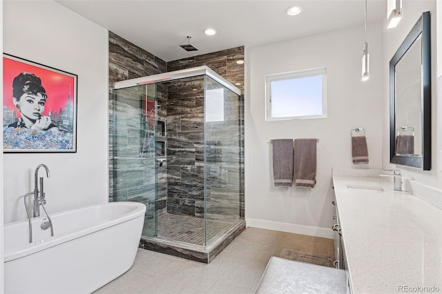1373 S Garfield St, Denver, CO 80210 - full bathroom featuring a stall shower, recessed lighting, vanity, a freestanding tub, and baseboards