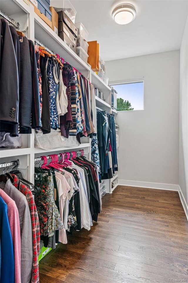 1373 S Garfield St, Denver, CO 80210 - spacious closet featuring wood finished floors