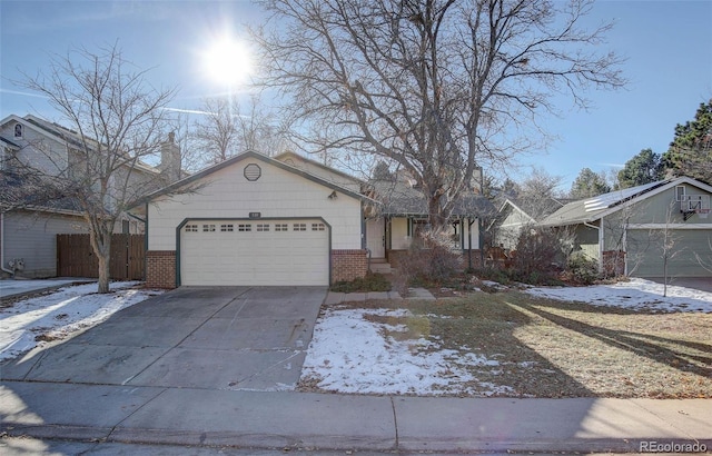 ranch-style home with a garage