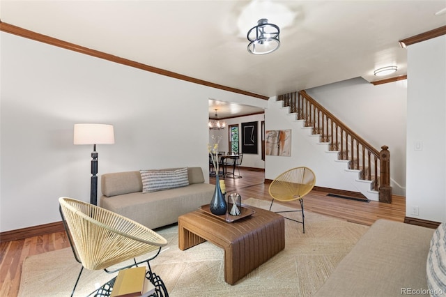 3039 W 22nd Ave, Denver, CO 80211 - living room with ornamental molding, stairway, wood finished floors, and a chandelier