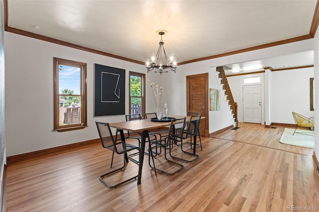 3039 W 22nd Ave, Denver, CO 80211 - dining space with a chandelier, stairs, light wood-style floors, and crown molding