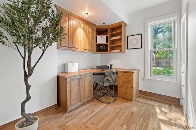 3039 W 22nd Ave, Denver, CO 80211 - home office featuring built in desk and baseboards
