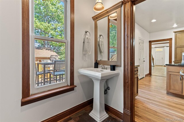 3039 W 22nd Ave, Denver, CO 80211 - bathroom featuring healthy amount of natural light, wood finished floors, and recessed lighting