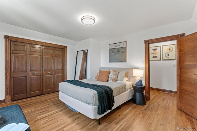 3039 W 22nd Ave, Denver, CO 80211 - bedroom with light wood-style floors and baseboards