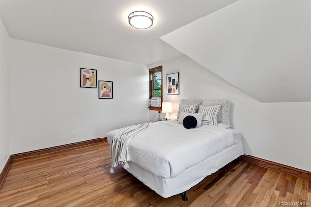 3039 W 22nd Ave, Denver, CO 80211 - bedroom with baseboards and light wood-style flooring