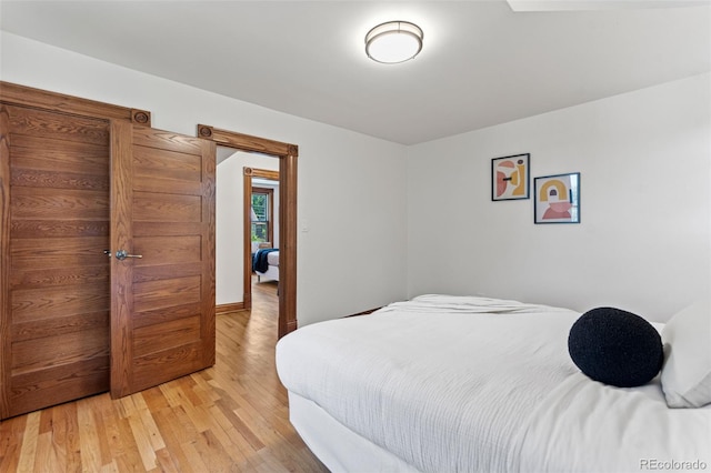 3039 W 22nd Ave, Denver, CO 80211 - bedroom featuring light wood-style flooring