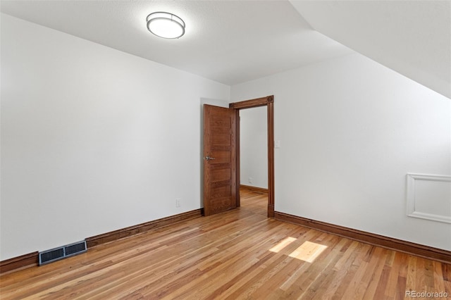 3039 W 22nd Ave, Denver, CO 80211 - bonus room featuring baseboards and light wood-type flooring