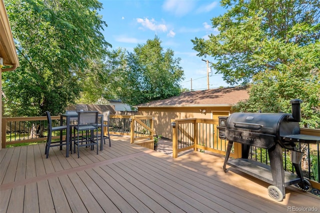 3039 W 22nd Ave, Denver, CO 80211 - wooden deck with area for grilling and outdoor dining space