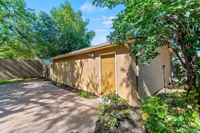 3039 W 22nd Ave, Denver, CO 80211 - view of home's exterior featuring a patio area and stucco siding