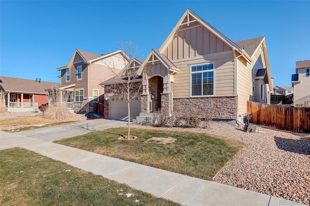 view of front facade featuring a garage and a front yard