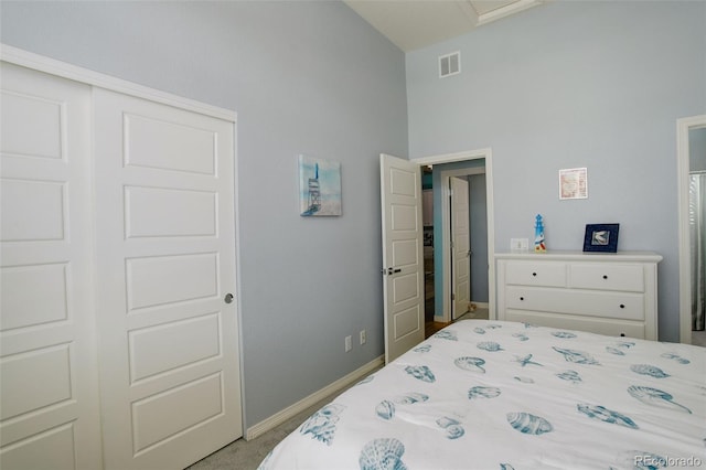 carpeted bedroom with a closet