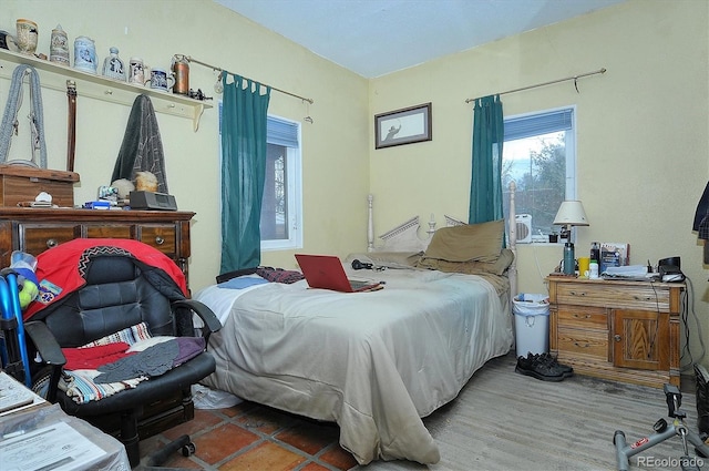 bedroom featuring hardwood / wood-style flooring