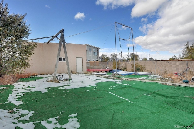 view of basketball court with a swimming pool