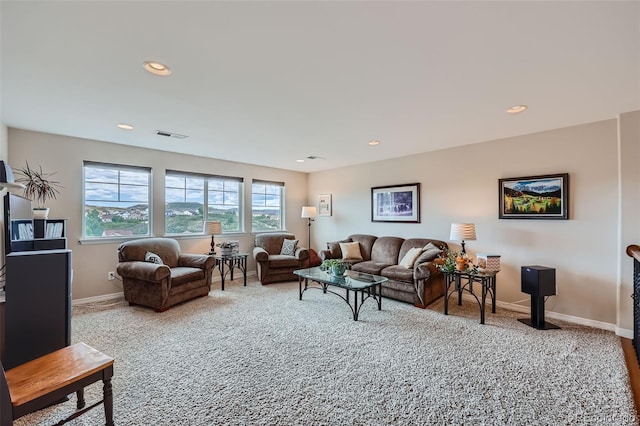 living area featuring recessed lighting, carpet, visible vents, and baseboards