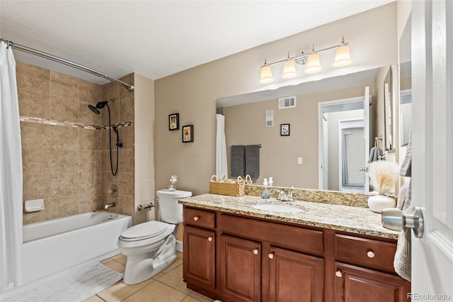 full bath featuring toilet, visible vents, tile patterned flooring, vanity, and shower / bath combo