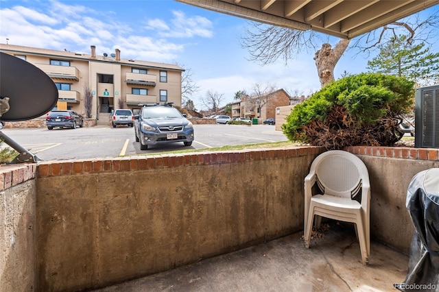 view of patio / terrace featuring cooling unit and grilling area