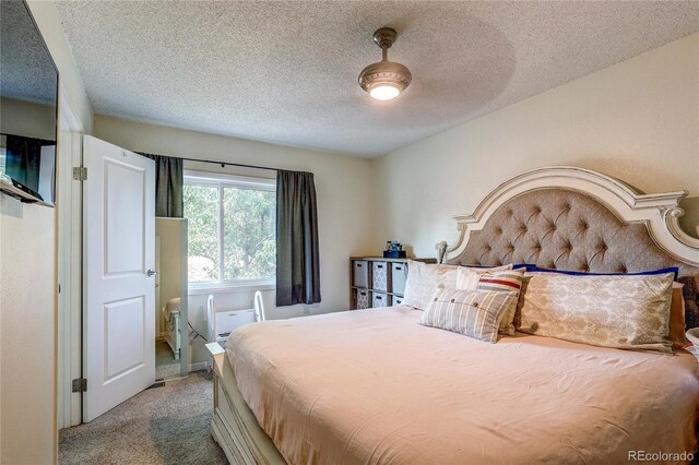 3572 S Kittredge St Unit B, Aurora, CO 80013 - carpeted bedroom with a textured ceiling