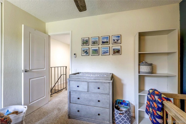 3572 S Kittredge St Unit B, Aurora, CO 80013 - carpeted bedroom featuring a textured ceiling