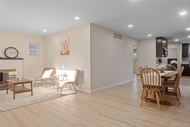 dining space featuring light hardwood / wood-style flooring