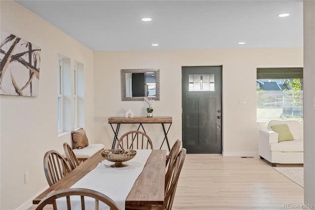 dining room with light hardwood / wood-style flooring