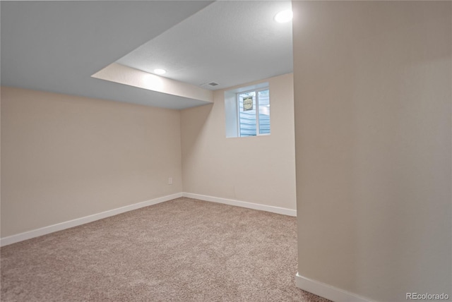 basement with light carpet