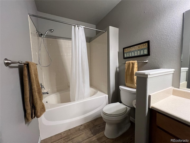 full bathroom with wood-type flooring, vanity, toilet, and shower / bath combination with curtain