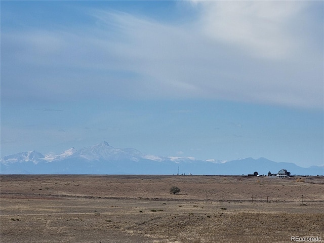 view of mountain feature with a rural view