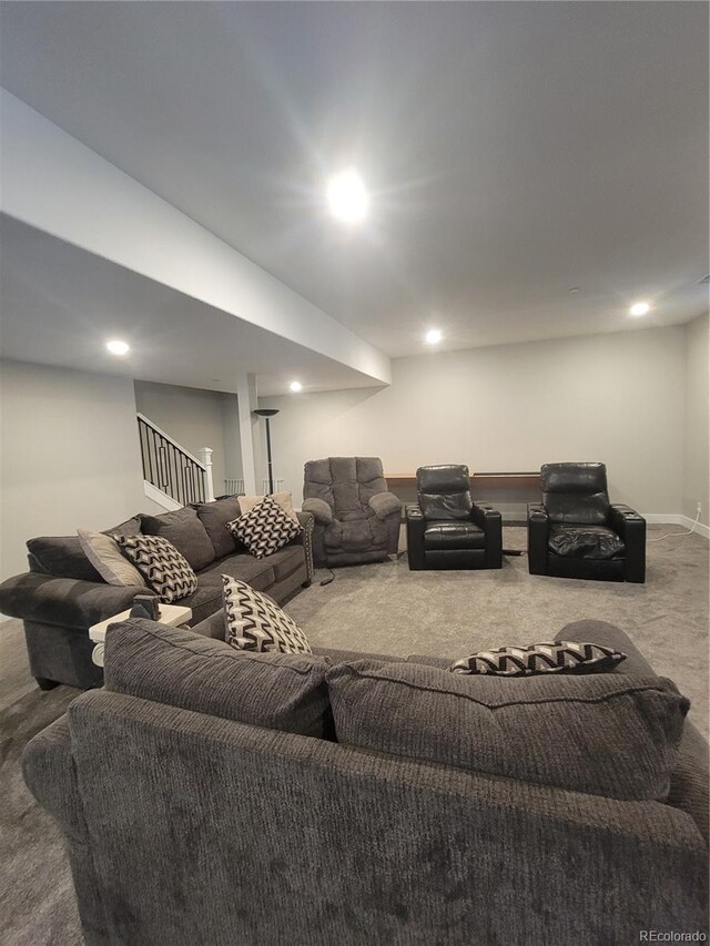 living room featuring stairway, carpet flooring, and recessed lighting