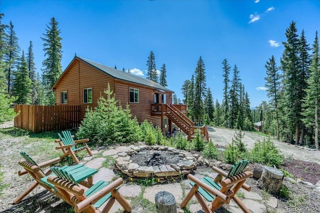 1387 Bobcat Ln, Fairplay, CO 80440 - rear view of house with a fire pit and stairs