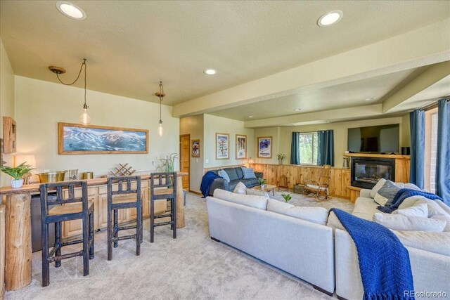 1387 Bobcat Ln, Fairplay, CO 80440 - living room featuring light carpet, recessed lighting, and a glass covered fireplace