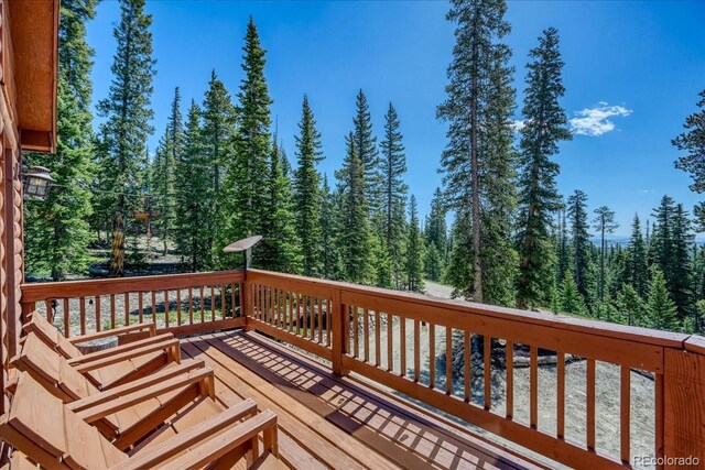 1387 Bobcat Ln, Fairplay, CO 80440 - wooden deck with a view of trees