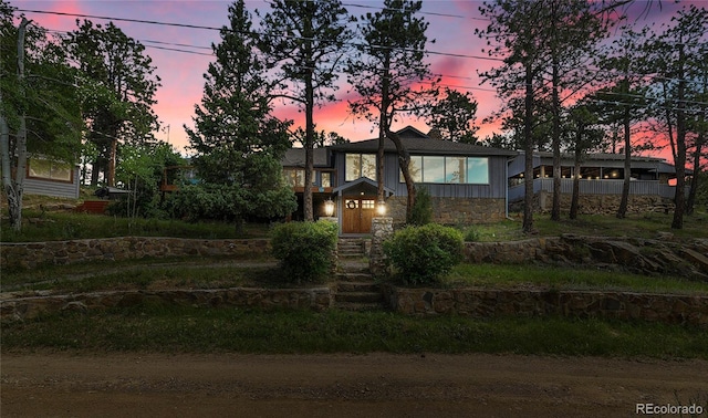 350 Tower Hill Cir, Golden, CO 80401 - view of front facade with stone siding and board and batten siding