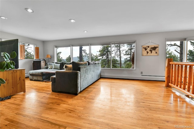 350 Tower Hill Cir, Golden, CO 80401 - living room featuring baseboard heating, wood finished floors, and recessed lighting