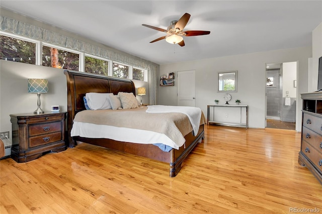 350 Tower Hill Cir, Golden, CO 80401 - bedroom with light wood-style flooring, ensuite bathroom, and ceiling fan