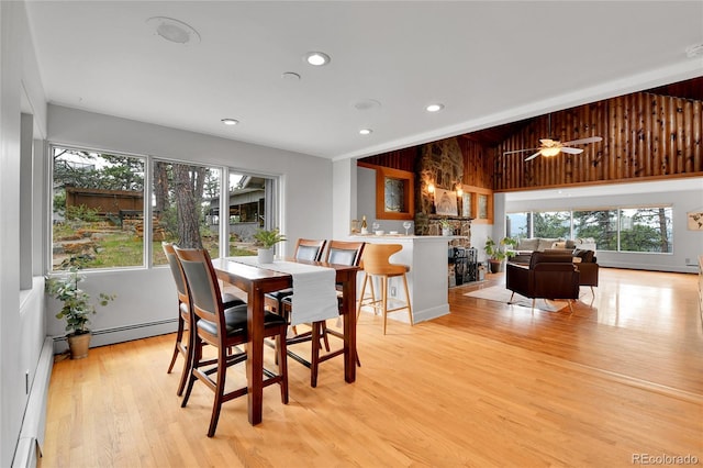 350 Tower Hill Cir, Golden, CO 80401 - dining room featuring plenty of natural light, light wood finished floors, recessed lighting, and a baseboard heating unit