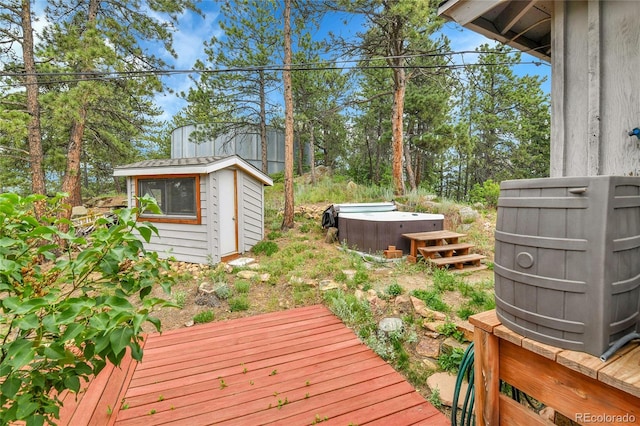 350 Tower Hill Cir, Golden, CO 80401 - wooden terrace featuring a hot tub and a storage shed