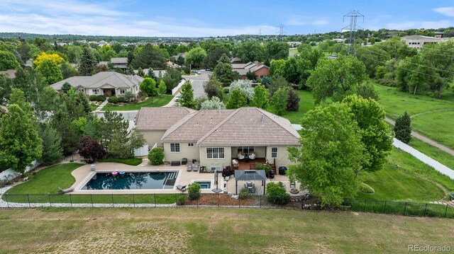5653 Yank St, Arvada, CO 80002 - view of subject property with a pool