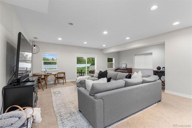 5653 Yank St, Arvada, CO 80002 - living area with light carpet, recessed lighting, and baseboards
