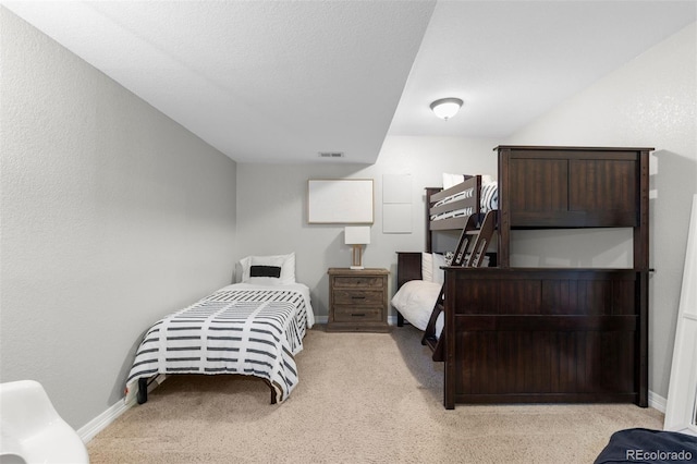 5653 Yank St, Arvada, CO 80002 - bedroom featuring light carpet and baseboards