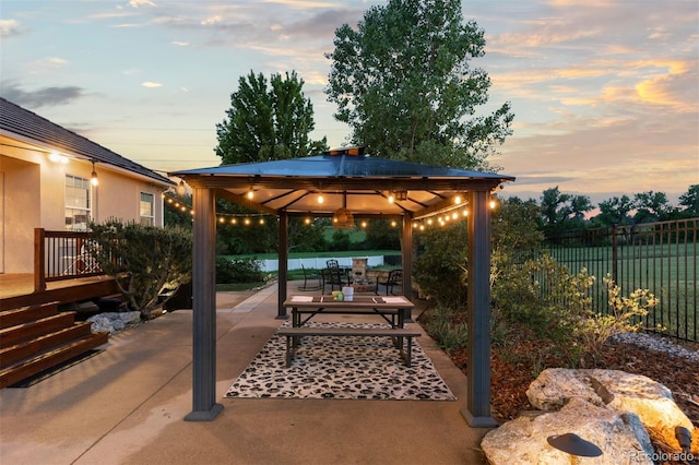 5653 Yank St, Arvada, CO 80002 - view of patio featuring a gazebo and outdoor dining area