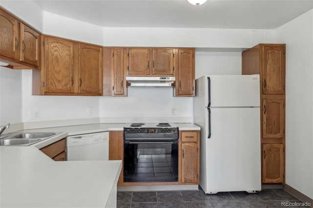 kitchen featuring sink and white appliances