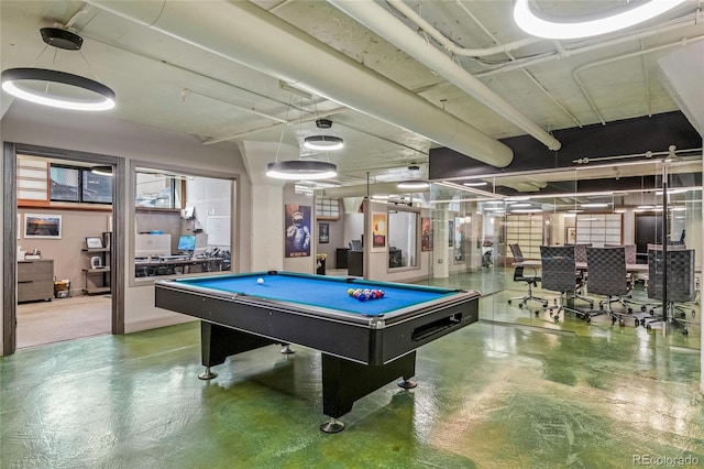 playroom with billiards and concrete flooring