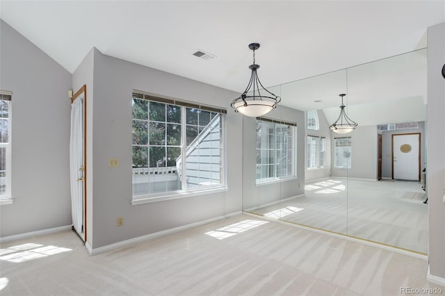 3951 S Carson St Unit D, Aurora, CO 80014 - unfurnished dining area with carpet, plenty of natural light, and baseboards