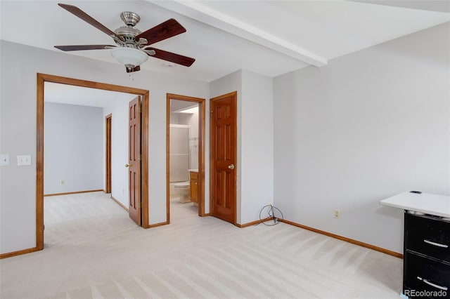 3951 S Carson St Unit D, Aurora, CO 80014 - unfurnished bedroom with light colored carpet, baseboards, connected bathroom, and a ceiling fan