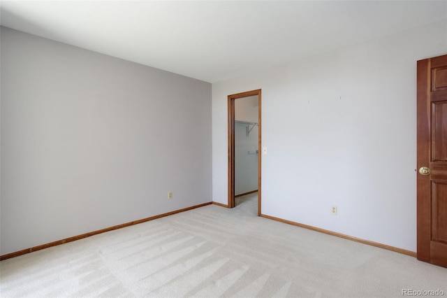 3951 S Carson St Unit D, Aurora, CO 80014 - empty room with light carpet and baseboards